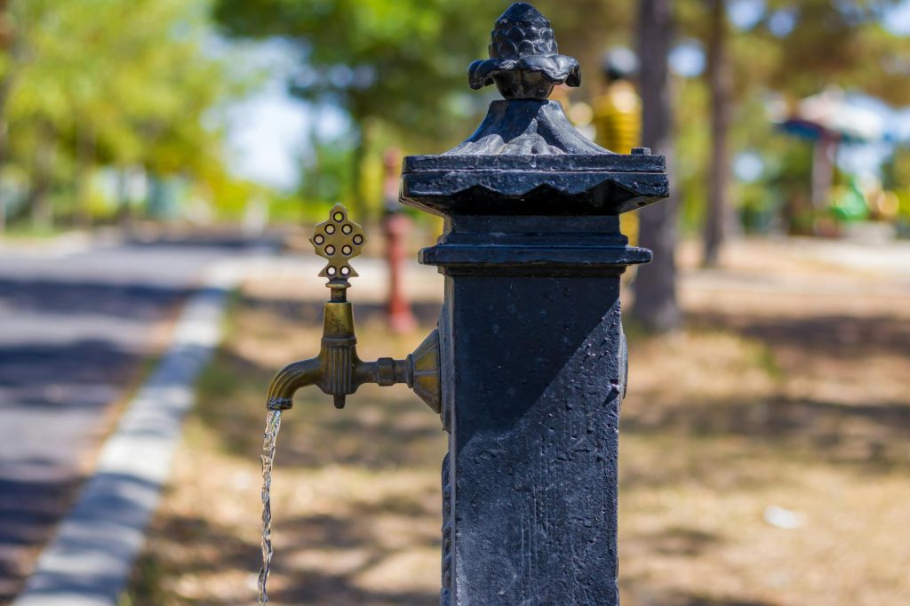 tap with drinking water along the street