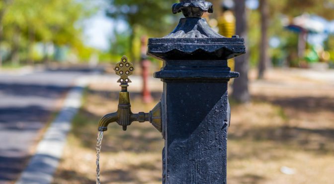 tap with drinking water along the street