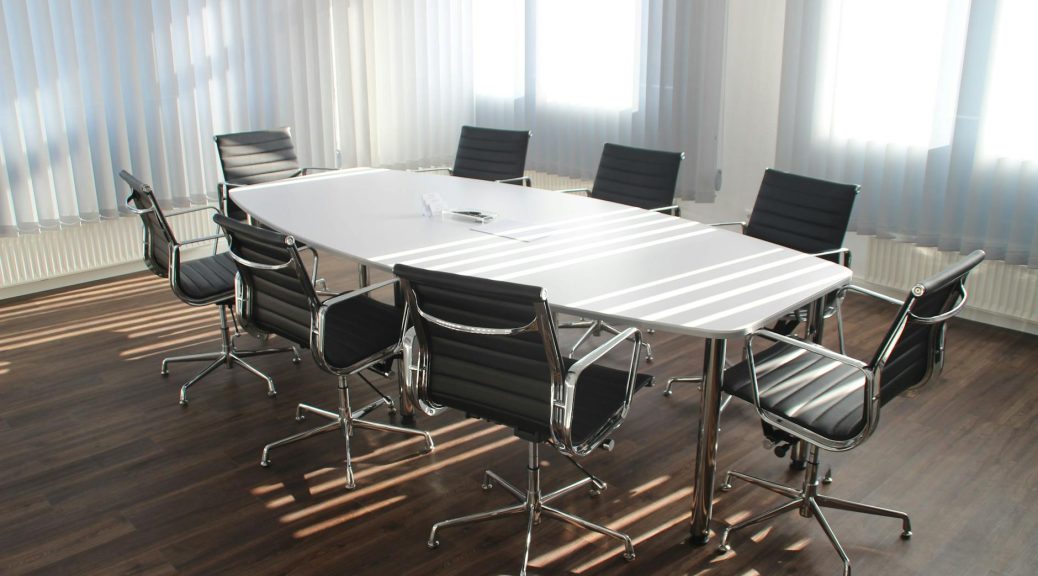 white wooden table with chairs set